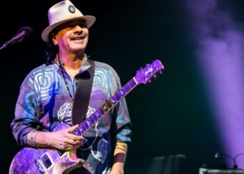 Due to "heat fatigue," Carlos Santana passes out on stage during a performance in Michigan; Reports