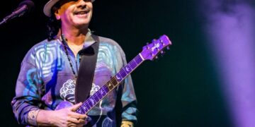 Due to "heat fatigue," Carlos Santana passes out on stage during a performance in Michigan; Reports