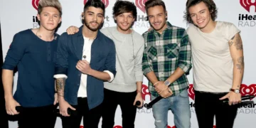 Does Louis Tomlinson communicate with the other members of One Direction? Singer DISCLAIMS
