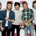 Does Louis Tomlinson communicate with the other members of One Direction? Singer DISCLAIMS