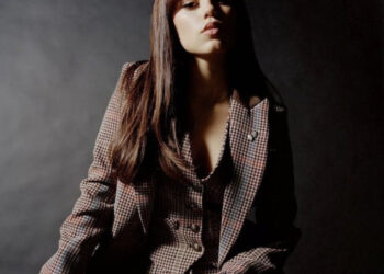 Jenna Ortega, a Wednesday star, wore a sheer Wednesdaycore dress with her new choppy hairstyle.