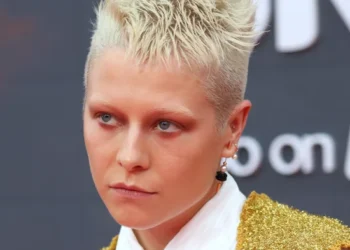 At the Golden Globes, Their Glitter Tear Matches Emma D’Arcy’s Blue Hair.
